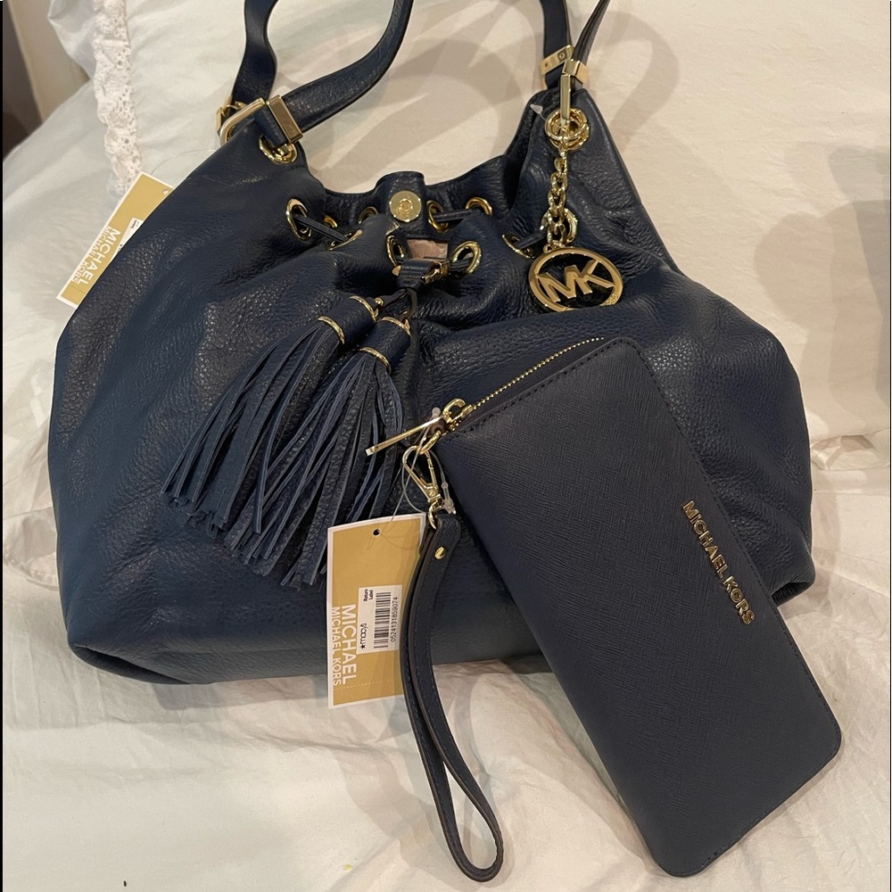 Navy Michael Kors purse and matching wallet. Tags still attached.